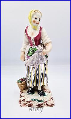 18TH CENTURY FRENCH LUNEVILLE FAIENCE FIGURE Woman Gathering Grapes